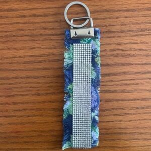 Fashionable floral wristlet keychain ! Rhinestones and frayed design ✨